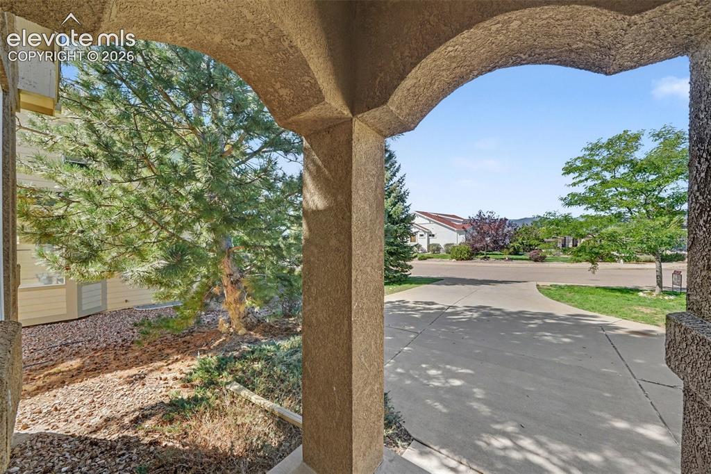 Image 3 of 41: Mountain views from the front of the home add a beautiful Colorado backdrop