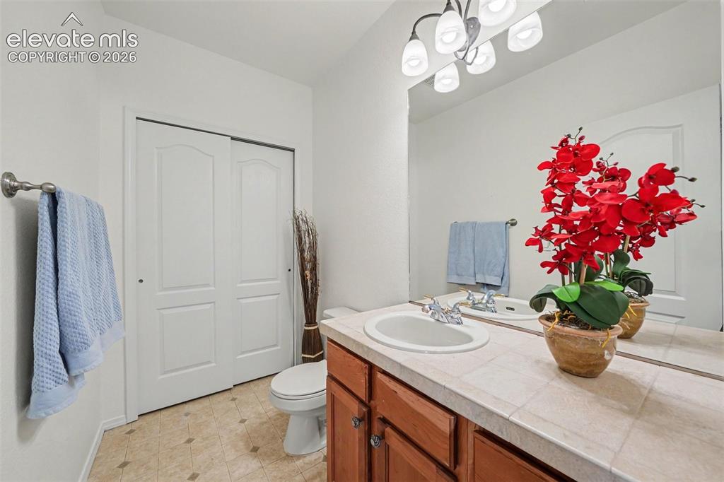 Image 32 of 41: Ideal half bath off of the rec room in the basement.