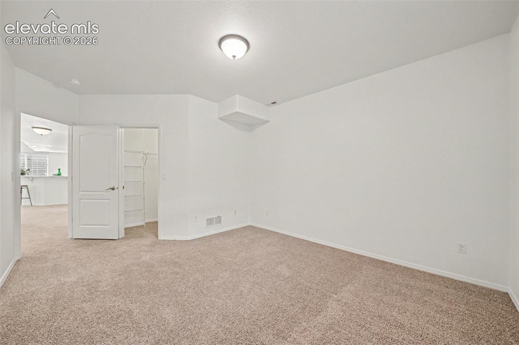 Image 35 of 41: Bedroom 2 in basement.