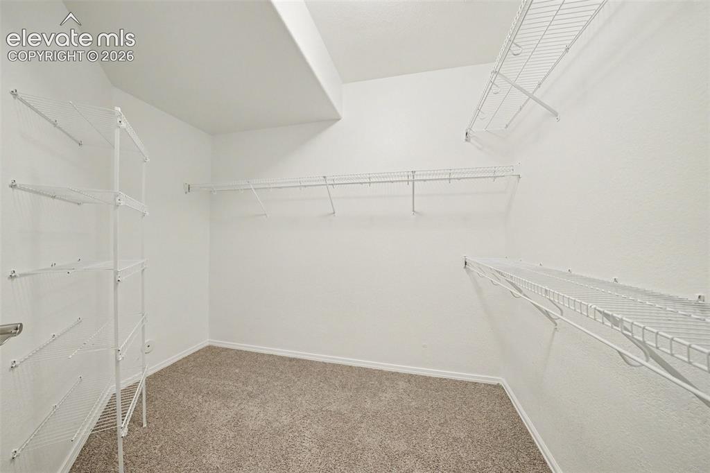 Image 36 of 41: Second walk-in closet in basement.