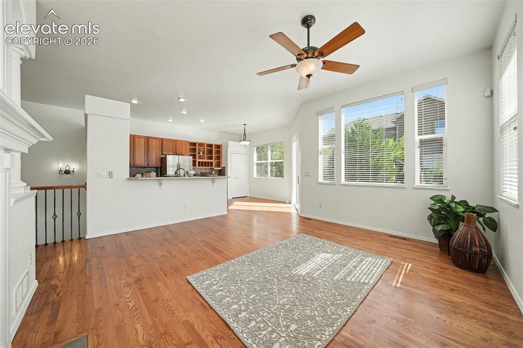 Image 5 of 41: The kitchen flows seamlessly into the living room.