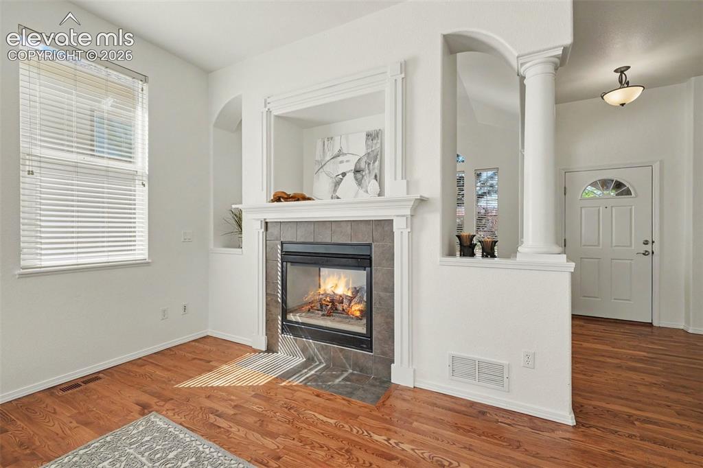 Image 7 of 41: Gorgeous real oak hardwood floors throughout the main-level living areas.