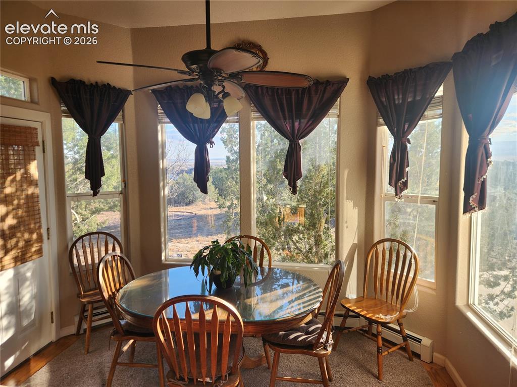 Image 16 of 50: Eat in kitchen furnished