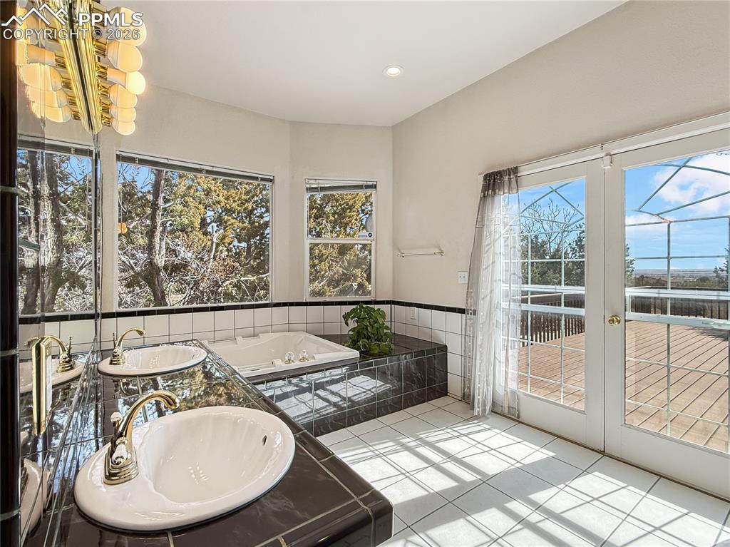 Image 21 of 50: Enjoy natural light and access to the large trex deck (very private)