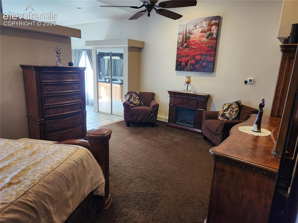 Image 21 of 50: Primary bedroom furnished