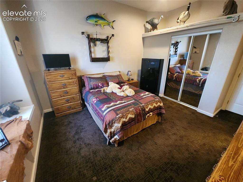 Image 25 of 50: bedroom 2 furnished