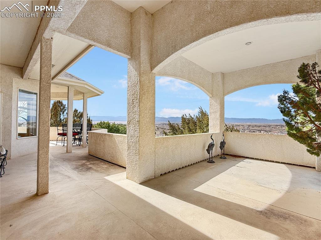 Image 33 of 50: Covered entrance makes for a grand statement