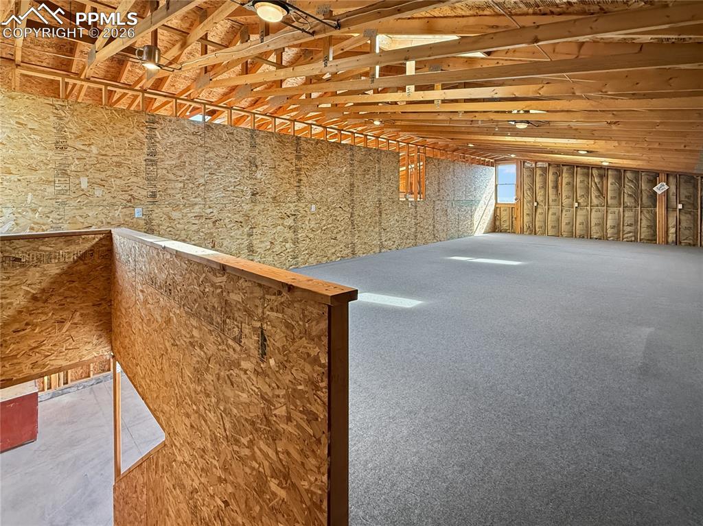 Image 38 of 50: detached garage with a huge workshop area