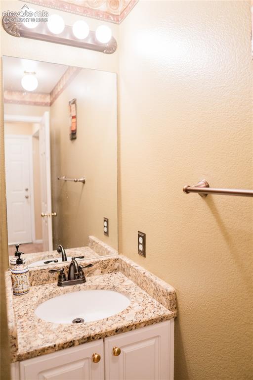 Image 13 of 34: full main level bathroom