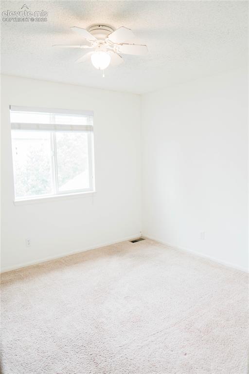 Image 20 of 34: upstairs bedroom next to primary