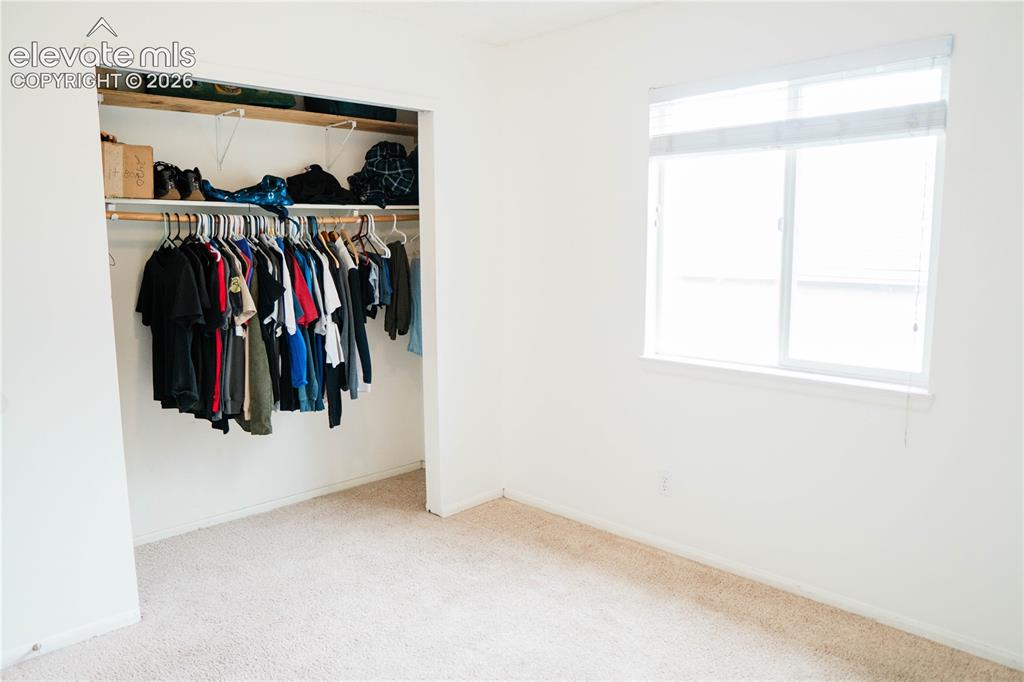 Image 21 of 34: another angle of upstairs bedroom next to primary