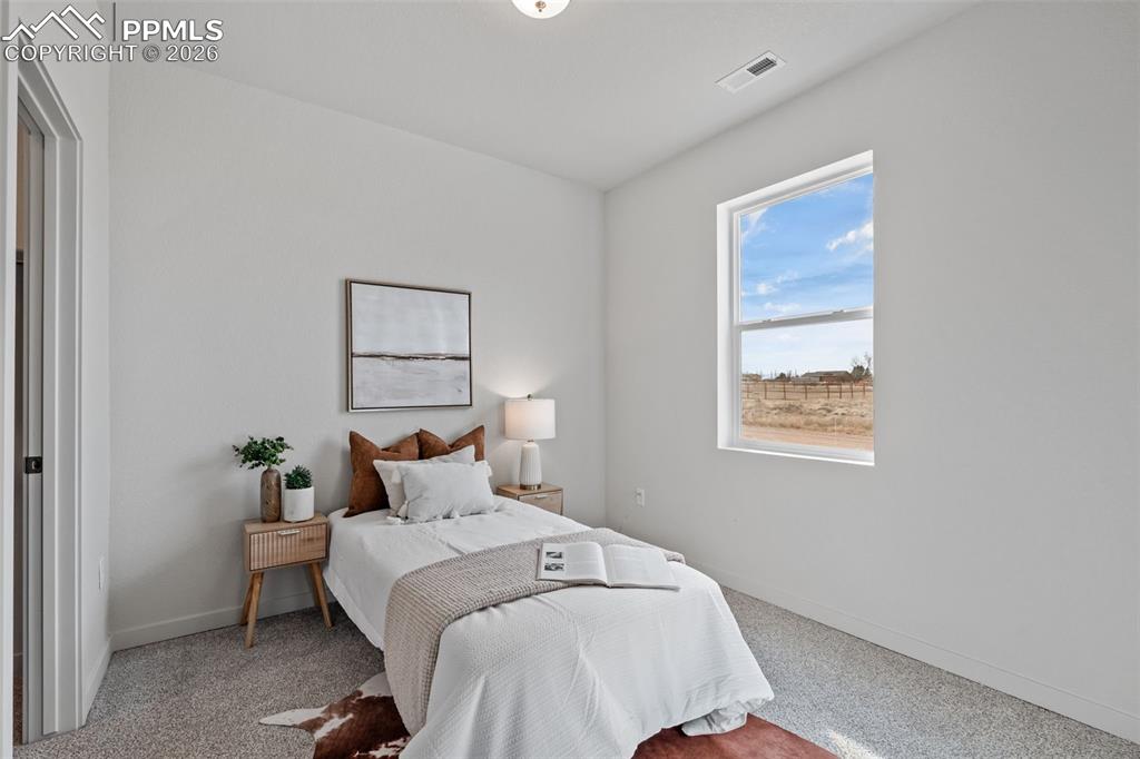 Image 20 of 38: Bedroom