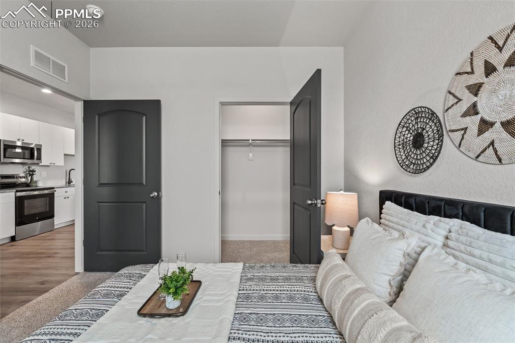 Image 32 of 38: Bedroom