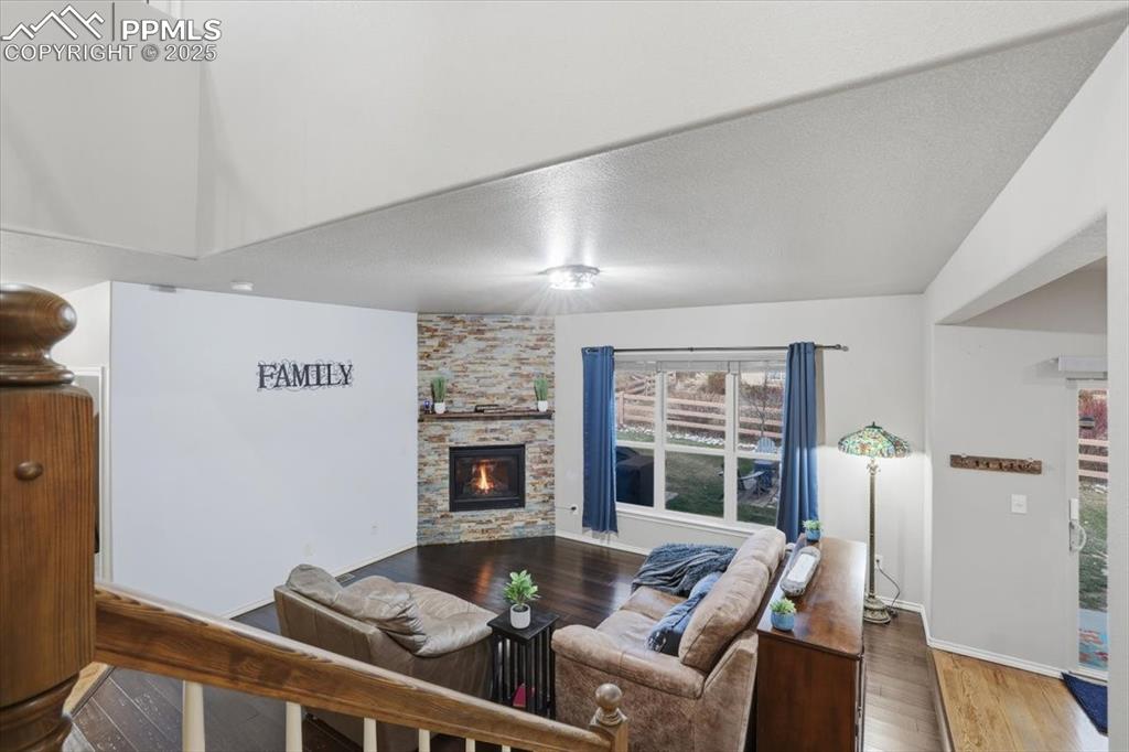Image 17 of 50: View of the living room from the stairs. 