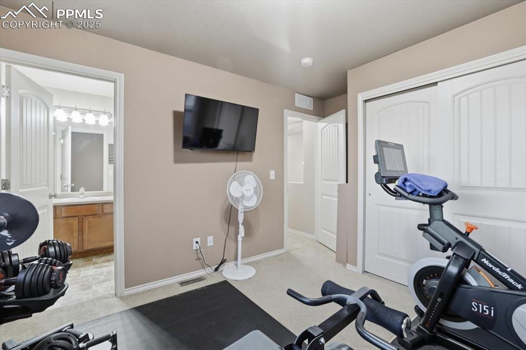 Image 34 of 50: The fourth upper level bedroom is a JUNIOR SUITE with its