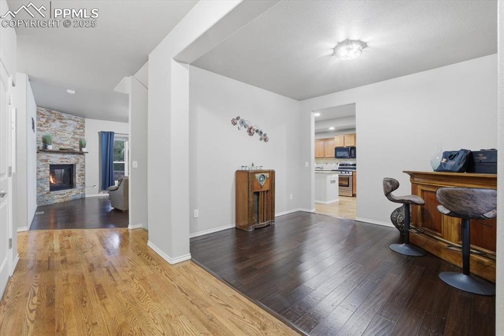 Image 4 of 50: The formal dining room connects to the kitchen. 