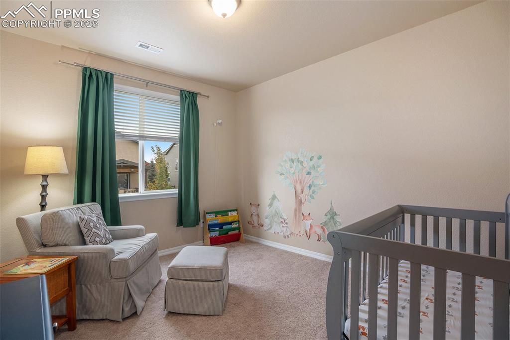 Image 20 of 27: Bedroom