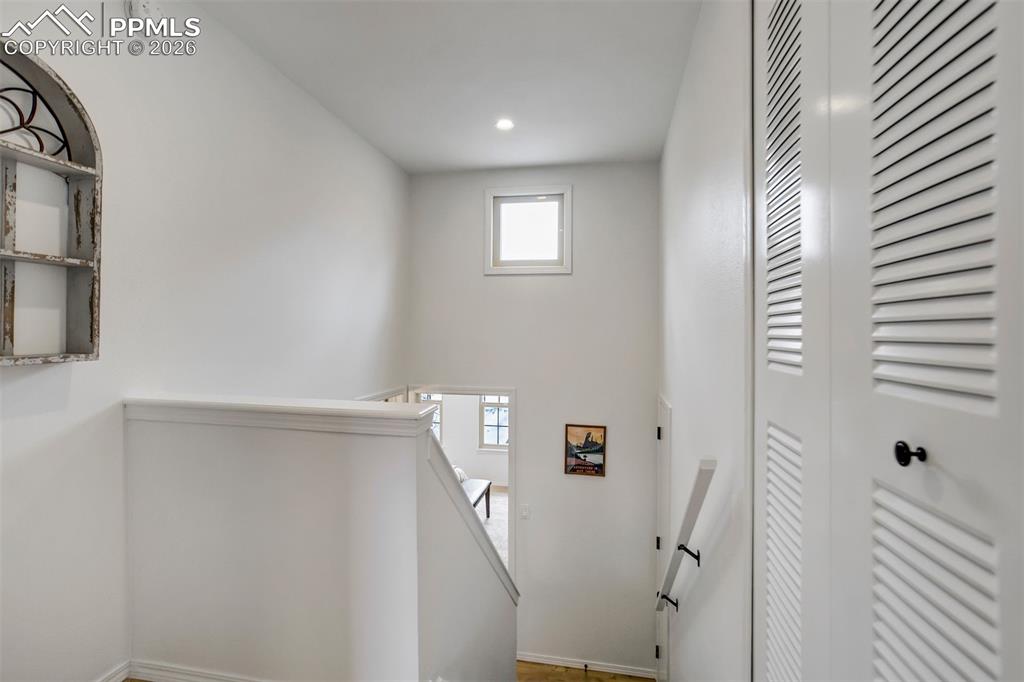 Image 24 of 39: Top landing area at the second bedroom. 