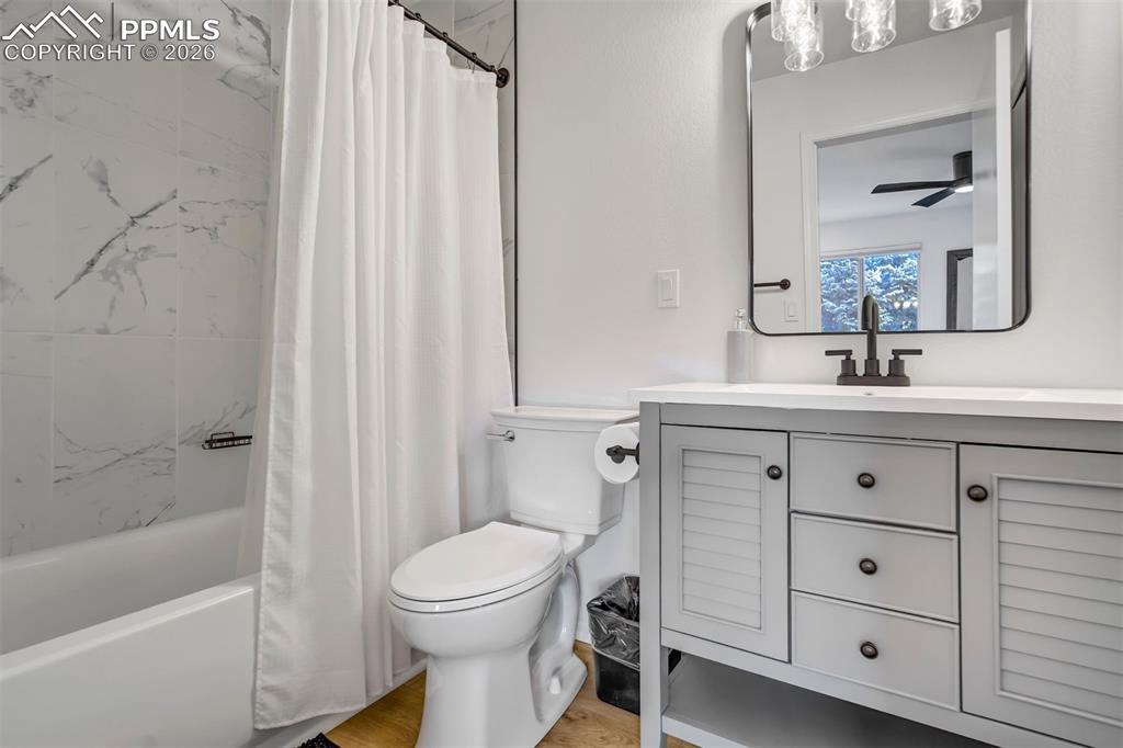 Image 28 of 39: Attached bathroom. 