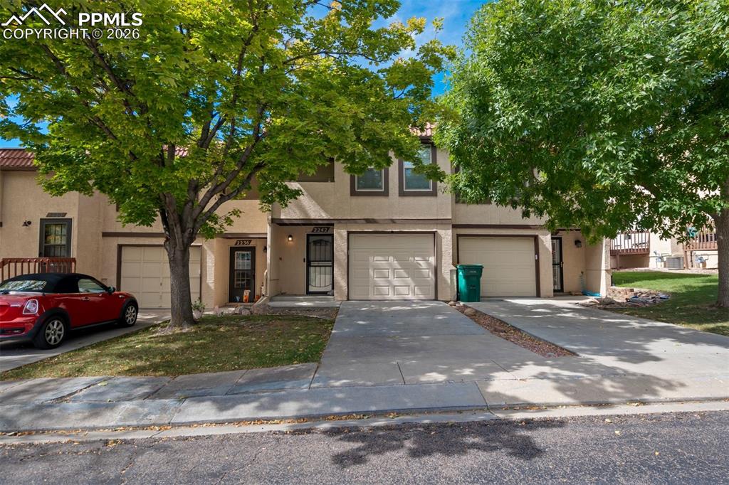 Image 37 of 39: A nice long driveway (that is shoveled for you). 
