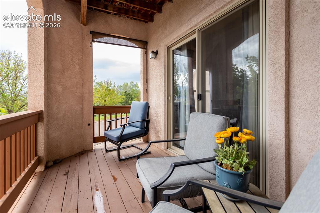 Image 15 of 44: Balcony with mountain view outside dining area