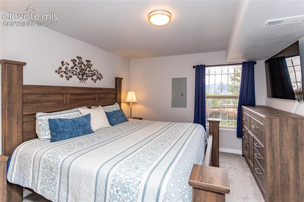 Image 37 of 44: Large basement bedroom