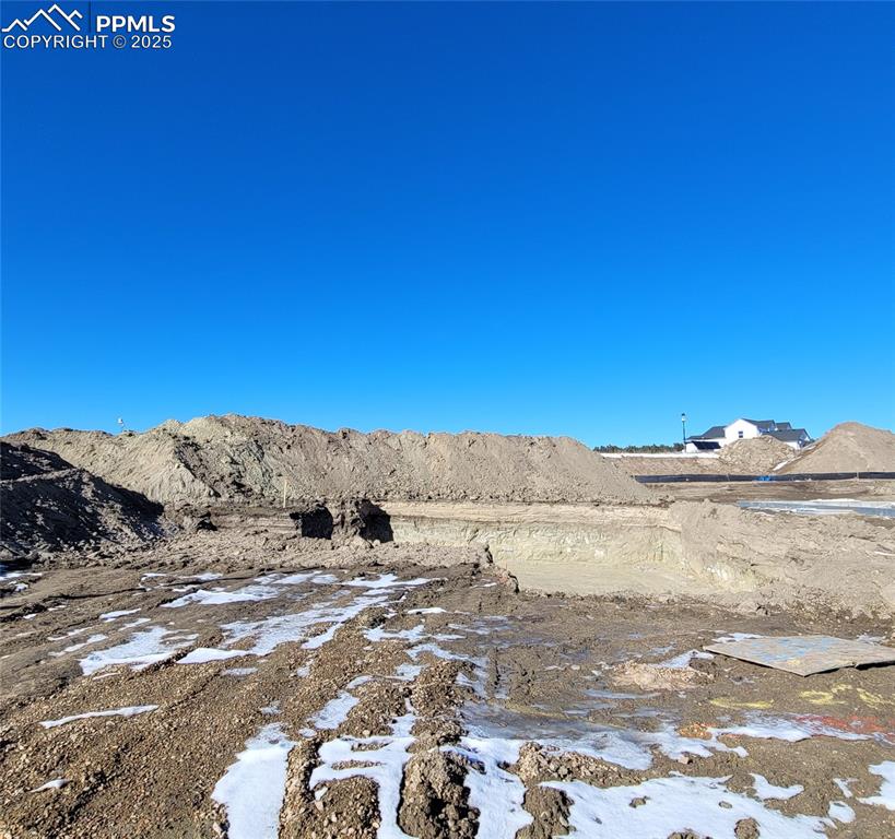 Caption: Falkirk-Colorado Elevation-Ranch Plan-3 Car Garage-Finished Basement with 9