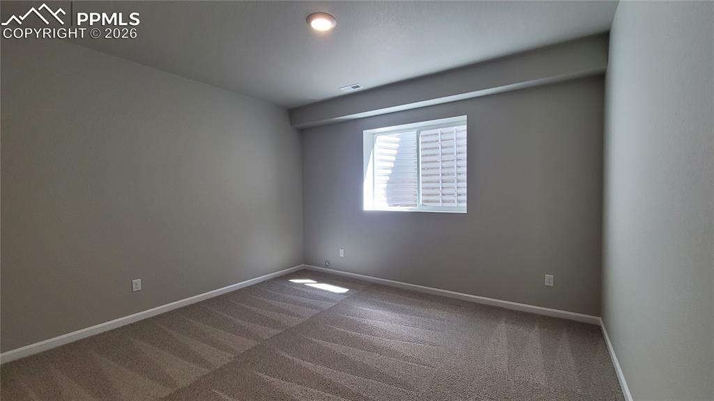 Image 31 of 38: Bedroom