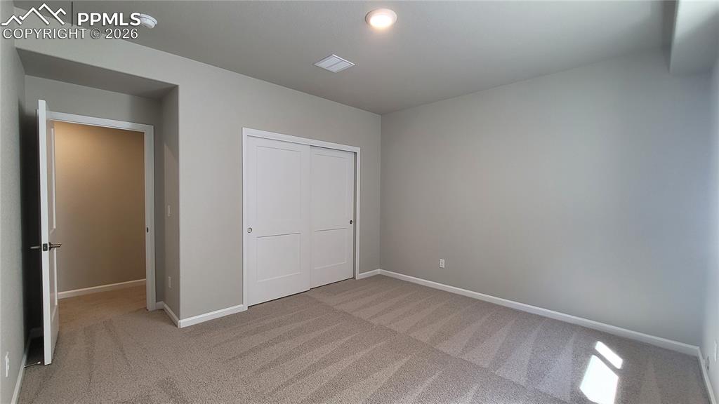 Image 32 of 38: Bedroom