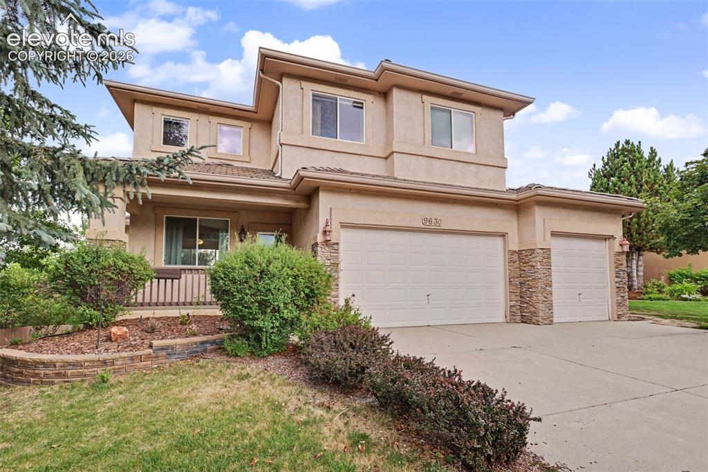 Image 1 of 47: Contemporary two-story residence featuring stucco exterior and prominent fr