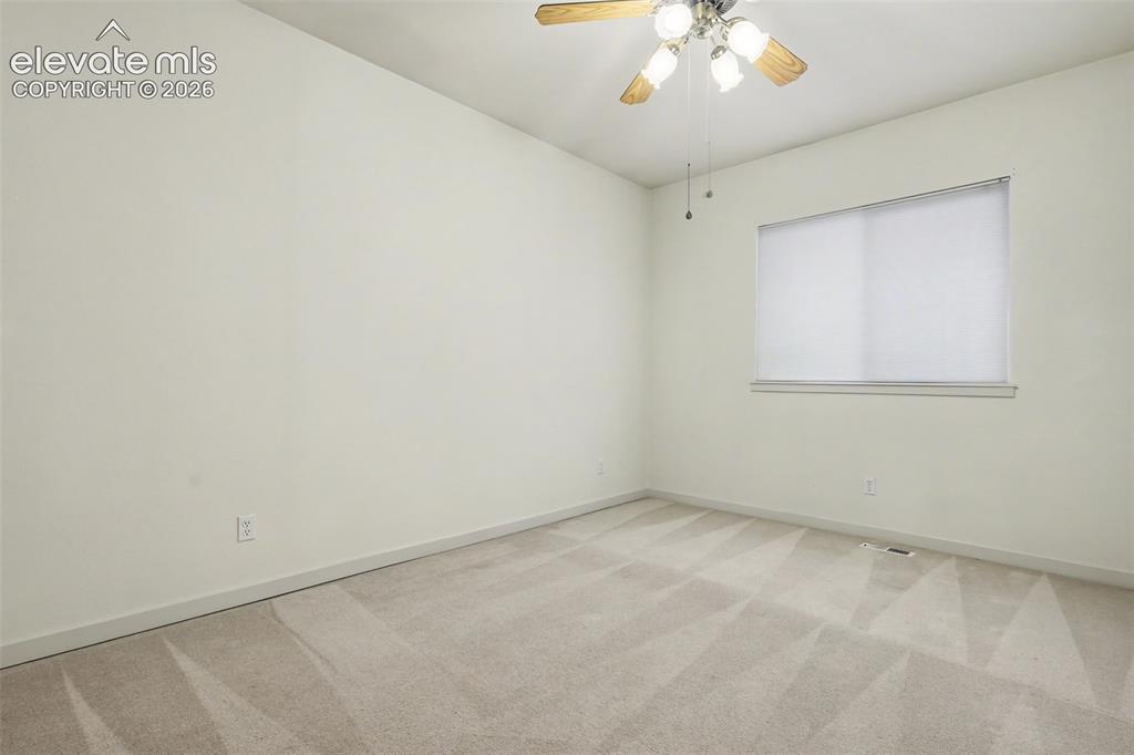 Image 36 of 47: Neutral-toned wall finishes throughout