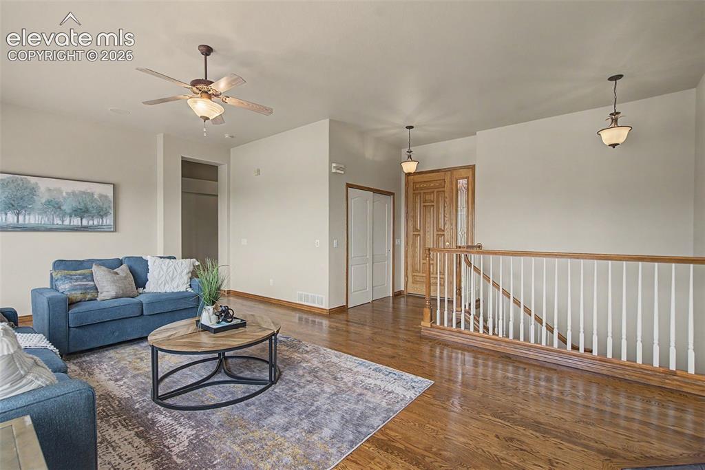 Image 12 of 50: View from entry, mountain view, lots of natural light