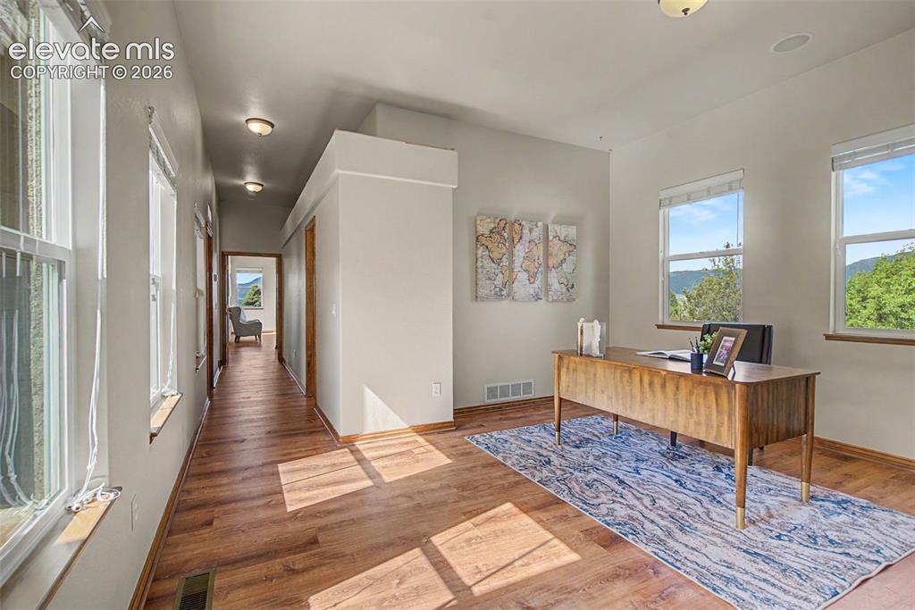 Image 29 of 50: This space can be an office, den, library, MIL suite