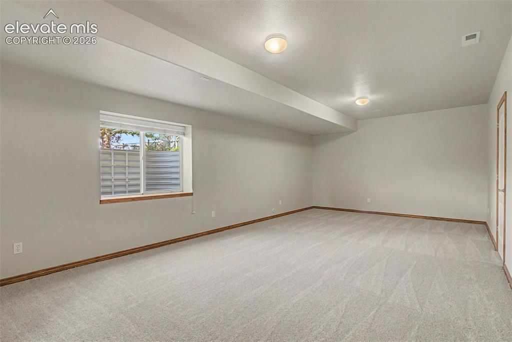 Image 40 of 50: Can be bedroom, rec room, hobby room, etc. has unfinished area that can be