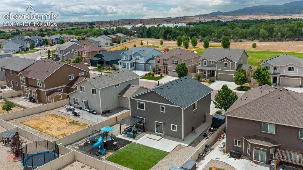 Image 36 of 41: Aerial perspective showcasing a residential neighborhood with varied archit