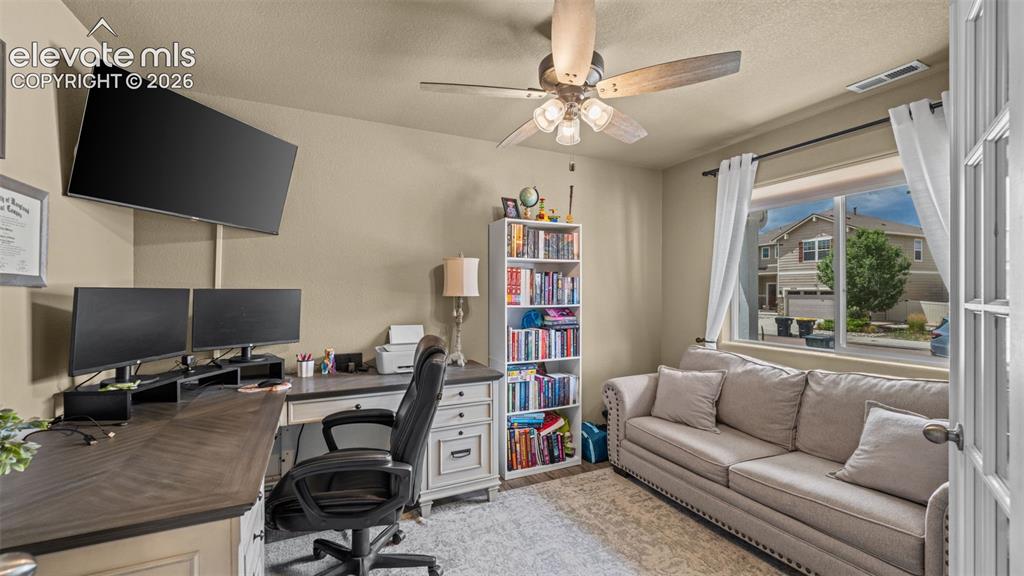 Image 5 of 41: Versatile bonus room featuring a window with exterior views, French doors,