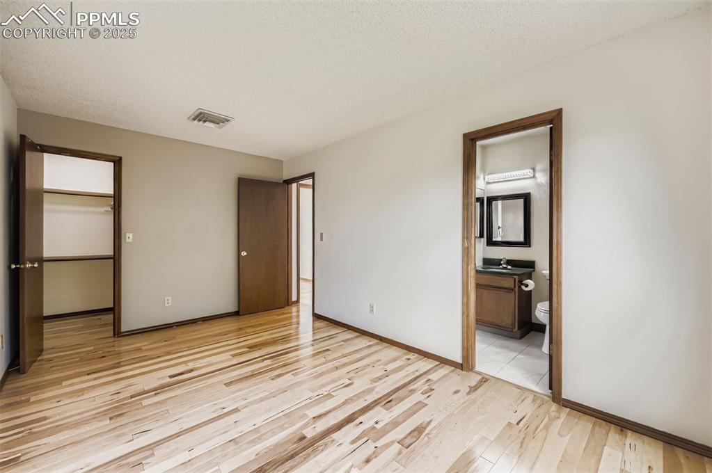 Image 13 of 45: Bedroom with ensuite.