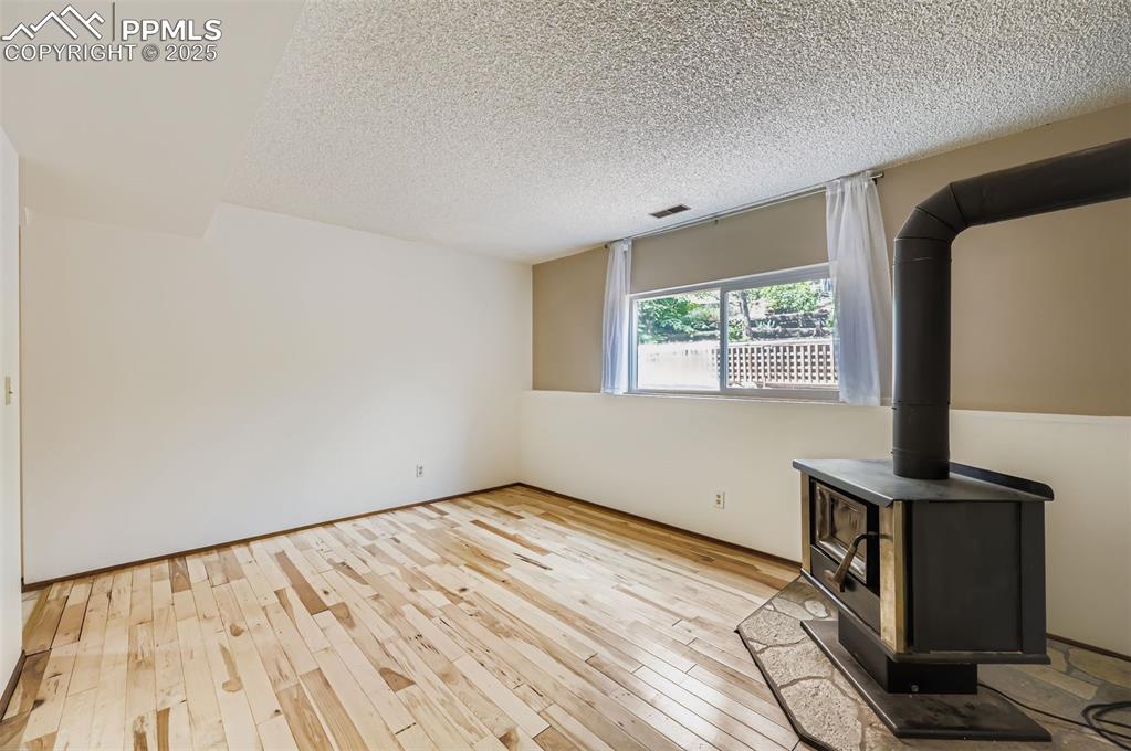 Image 22 of 45: Recreation room/family room... flex space... den, third bedroom, play room,