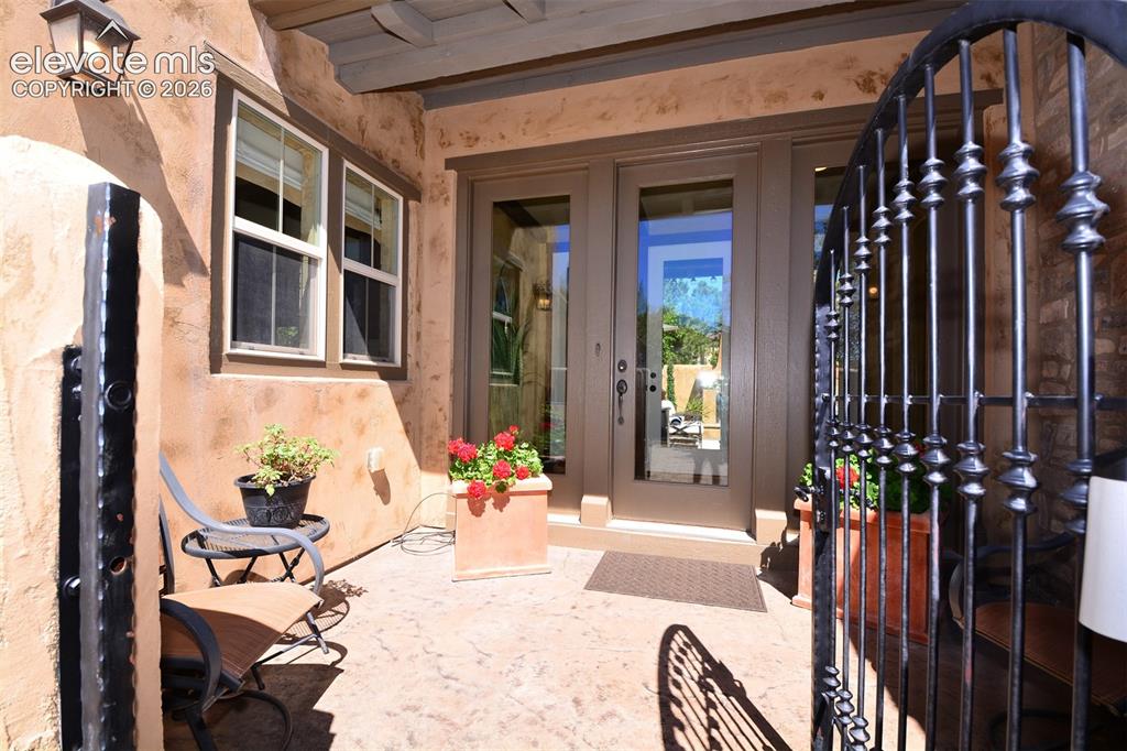 Image 14 of 31: private gated courtyard entry