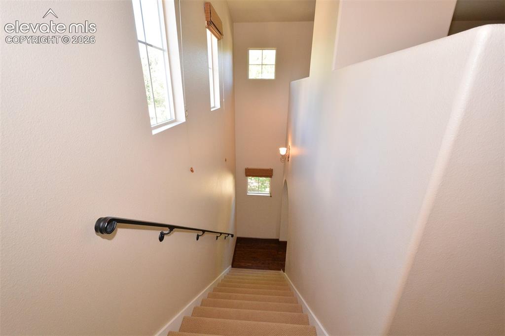 Image 15 of 31: stairway to upper level