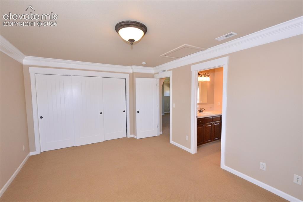 Image 17 of 31: Upper level bedroom