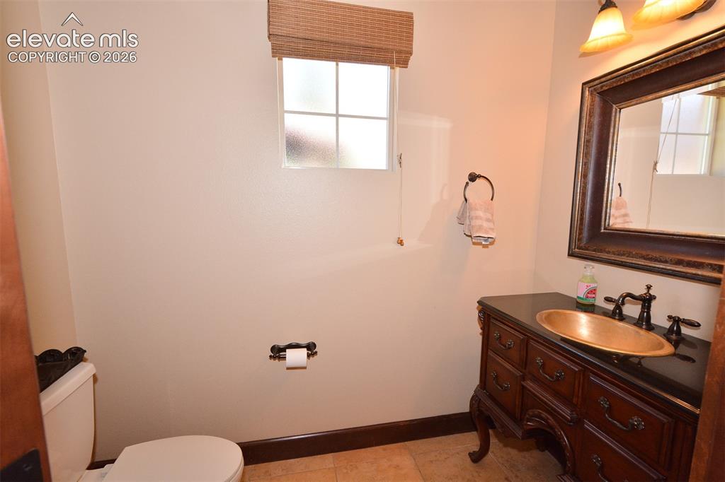 Image 21 of 31: Half bath on the main level
