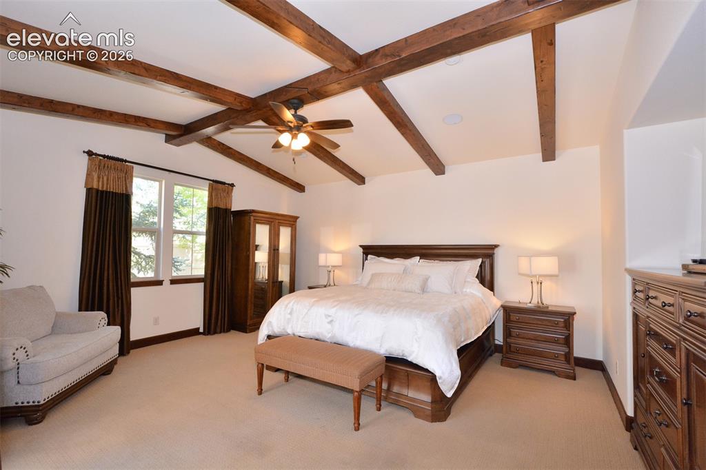 Image 6 of 31: Spacious primary bedroom on the main level