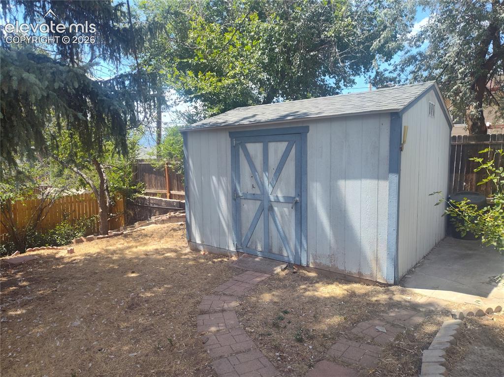 Image 18 of 18: Shed in backyard