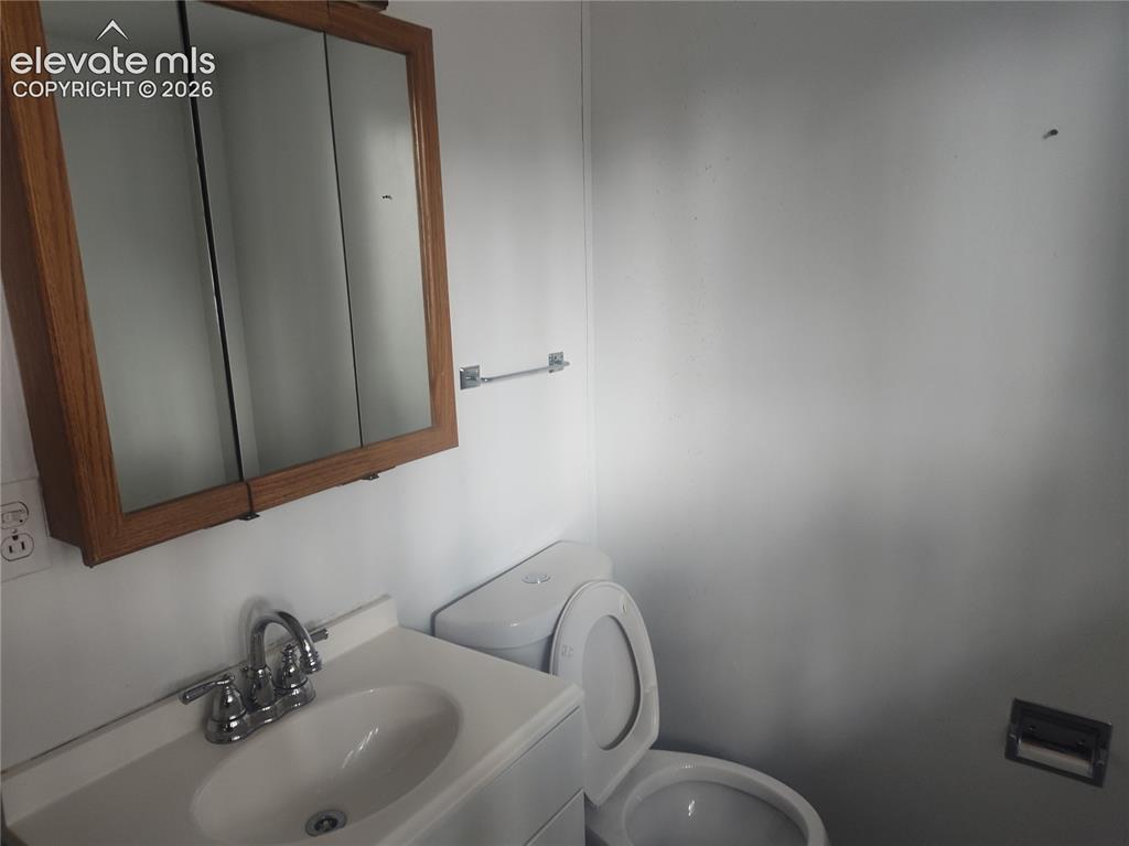 Image 8 of 18: Bathroom on lower level