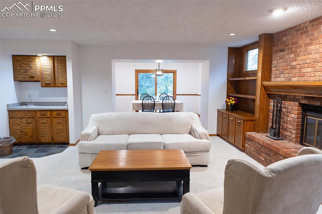 Image 10 of 47: Living room looking towards dining room.