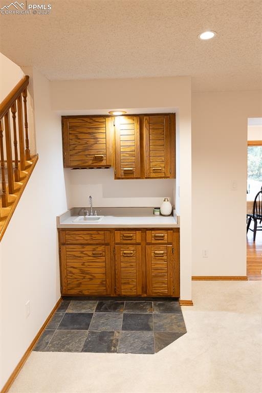 Image 12 of 47: Wet bar in the living room.