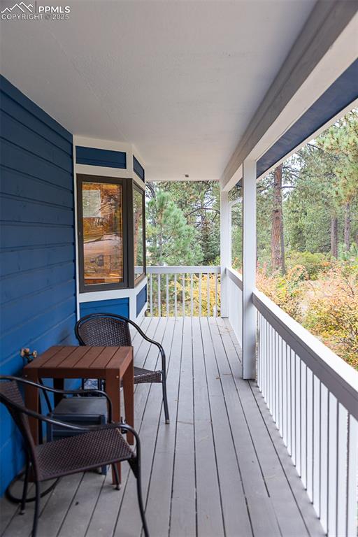 Image 3 of 47: Covered front porch.