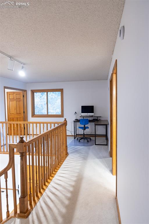 Image 36 of 47: Upper level has a loft area as well.