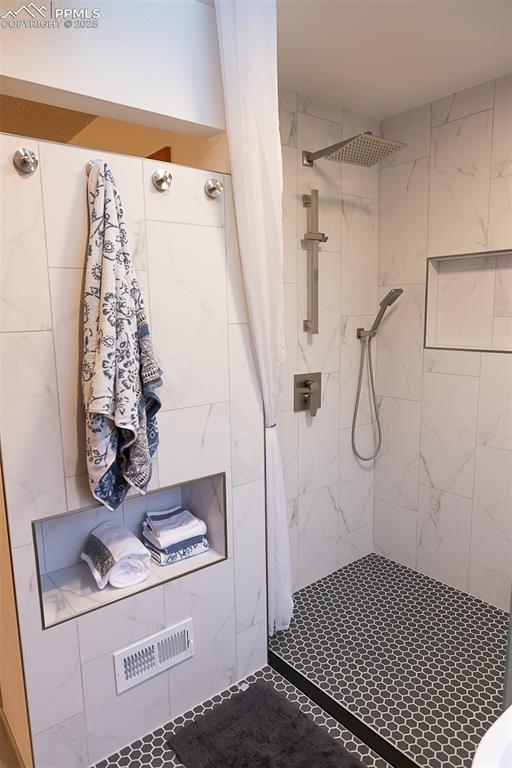 Image 43 of 47: New spa like shower in primary bathroom.